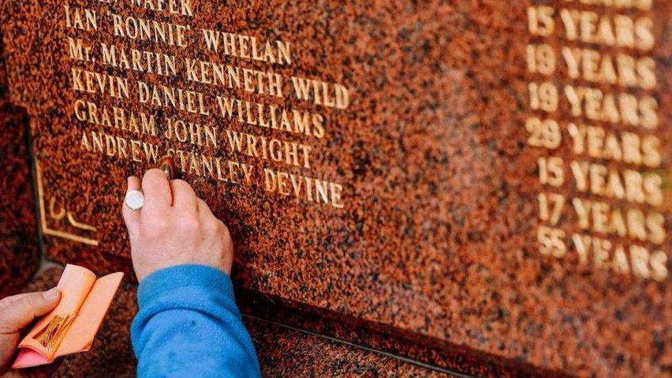 Andrew Devine's name engraved on memorial