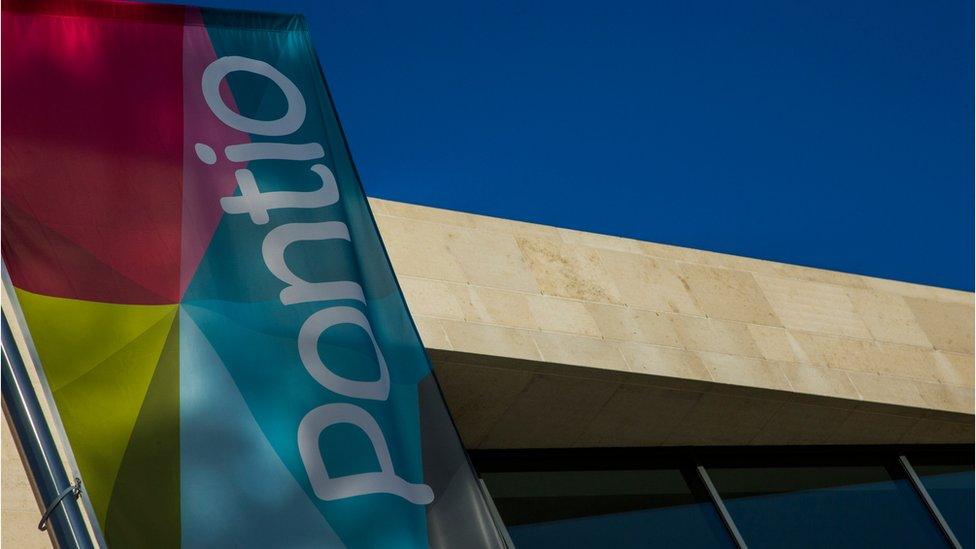 Pontio flag outside new building