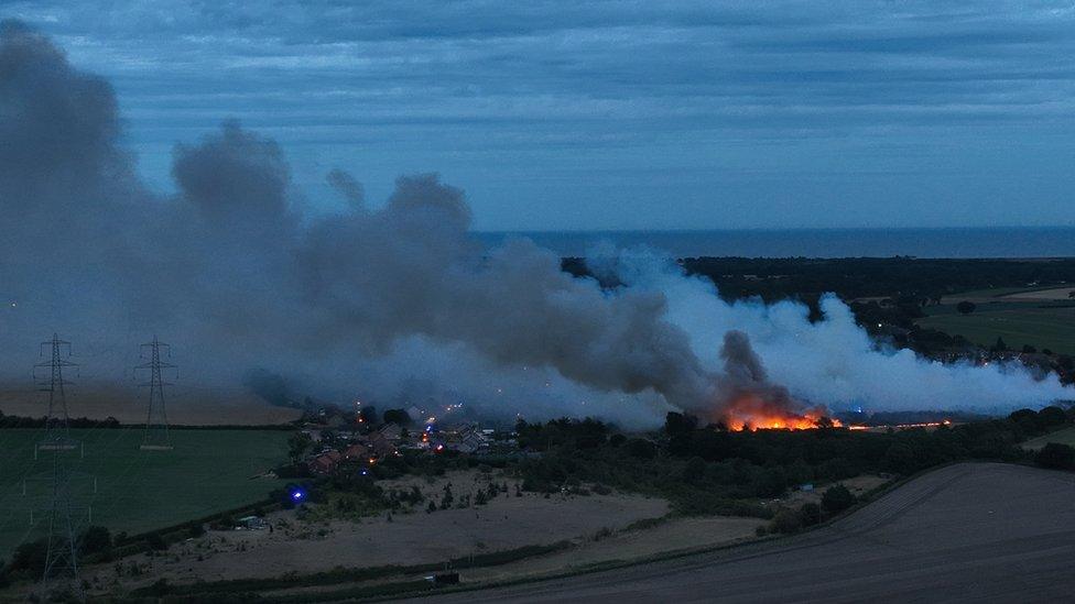 Drone image of fire at Knodishall Common