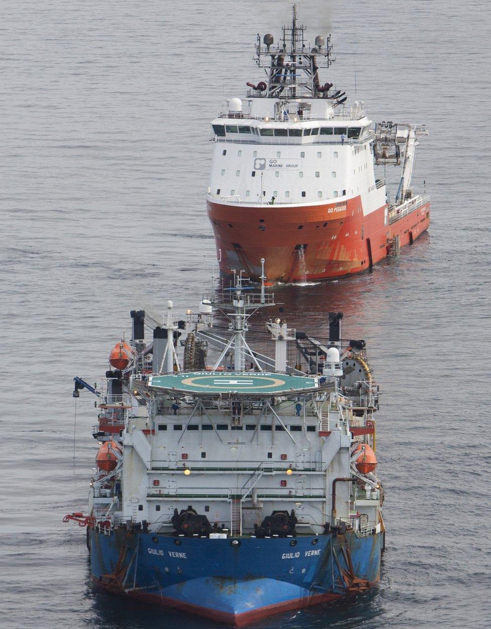 Ships laying offshore cables