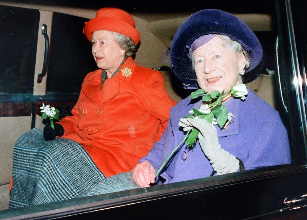 Queen Elizabeth II with the Queen Mother in a car at Sandringham, Norfolk, in 1997