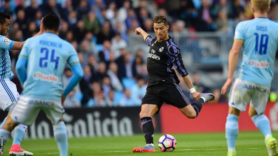 Cristiano Ronaldo scores against Celta Vigo as his team closed in on the La Liga title