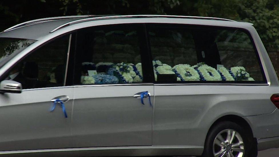 The cortege included a hearse with Freddie's name spelled out in flowers.