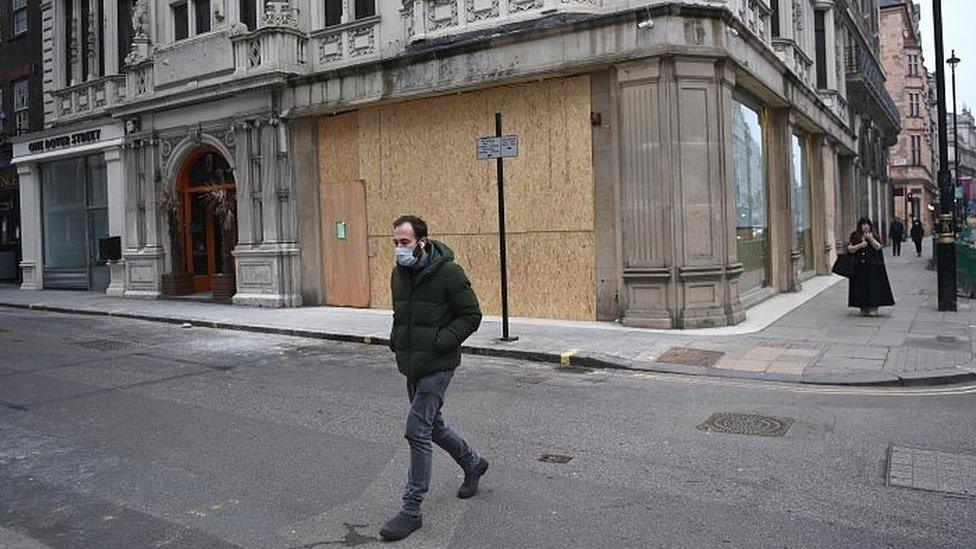 Boarded-up shop