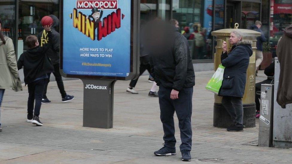 Man standing in zombie-like state in Manchester