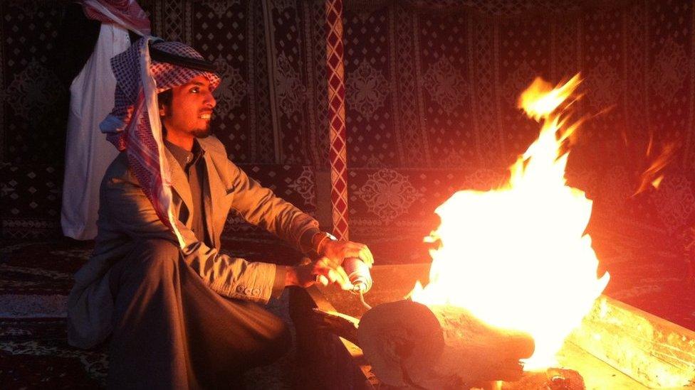 A camel trader in a tent at the camel market just outside Riyadh