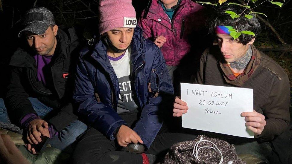 Iraqi migrants hiding in a Polish forest near the Polish town of Chelm shortly after crossing the border from Belarus.