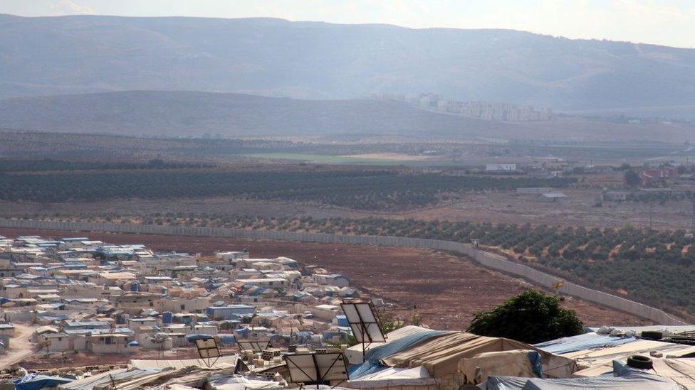 a refugee camp on the Turkish border