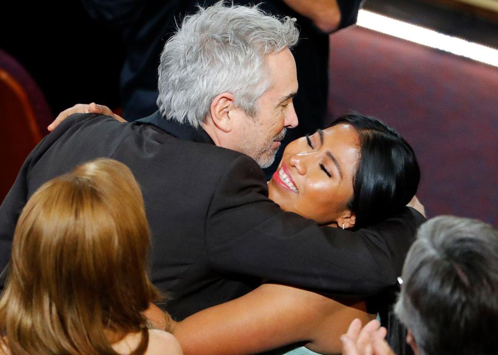 Alfonso Cuaron hugs Yalitza Aparicio