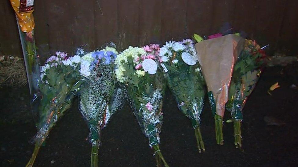 Floral tributes at the junction of Church Road and Church Place in Seven Sisters