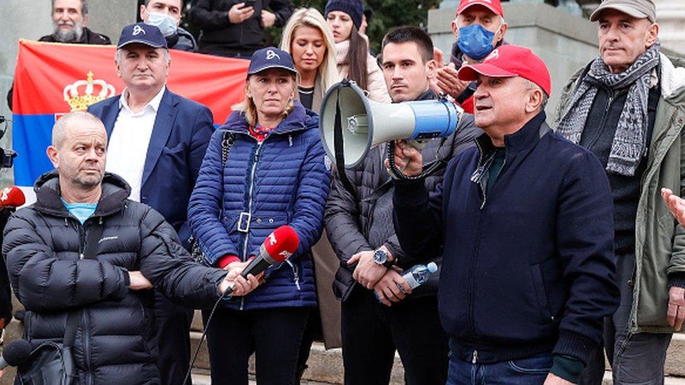 The family of Novak Djokovic attend a rally in front of Serbia's National Assembly