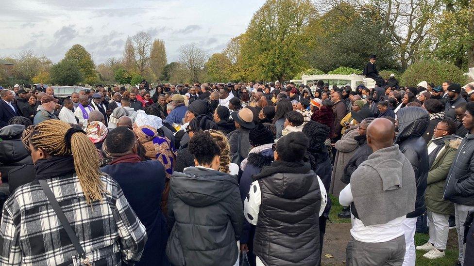 Family and friends attend Mr Kaba's funeral