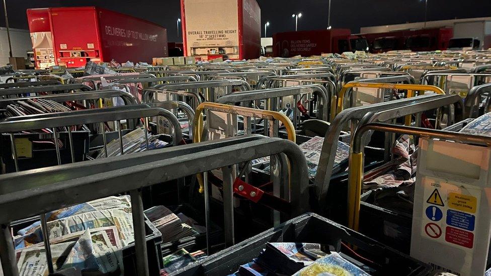 Marketing material in cages at the Bristol Mail Centre