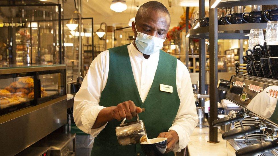 Barista at Harrods' coffee bar in London