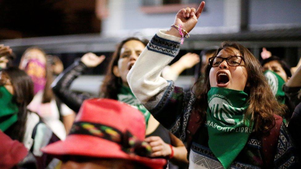 Pro-choice demonstrators react during a protest outside the National Assembly