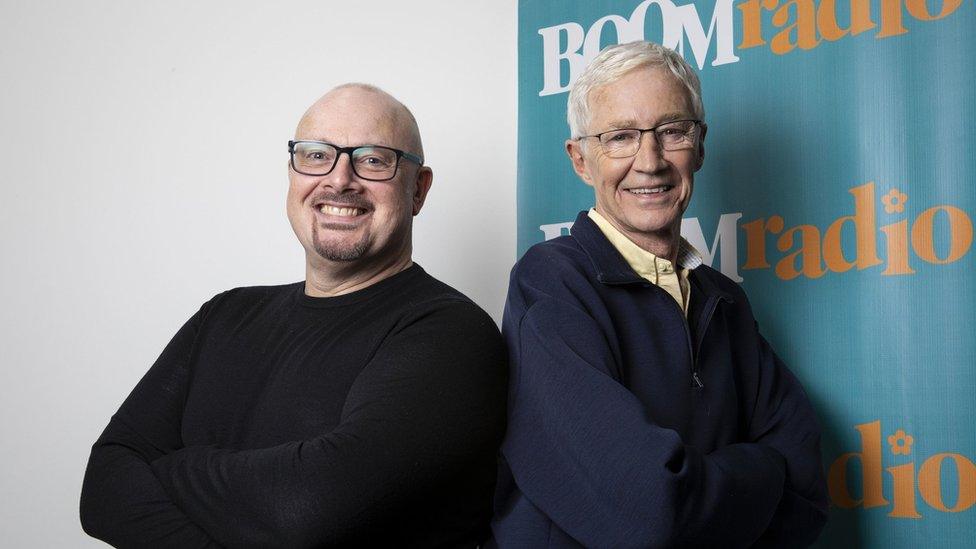 Producer Malcolm Prince (left) and Paul O'Grady as he is set to host a one off Easter Sunday radio show on Boom Radio, almost a year on from his departure from Radio 2