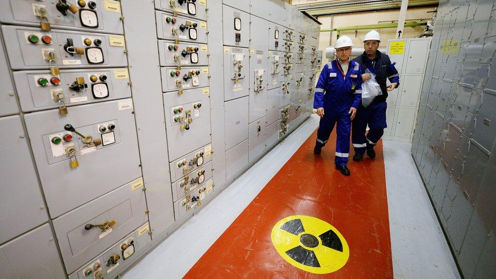 Workers at Hunterston B power station work in the cartridge cooling pond