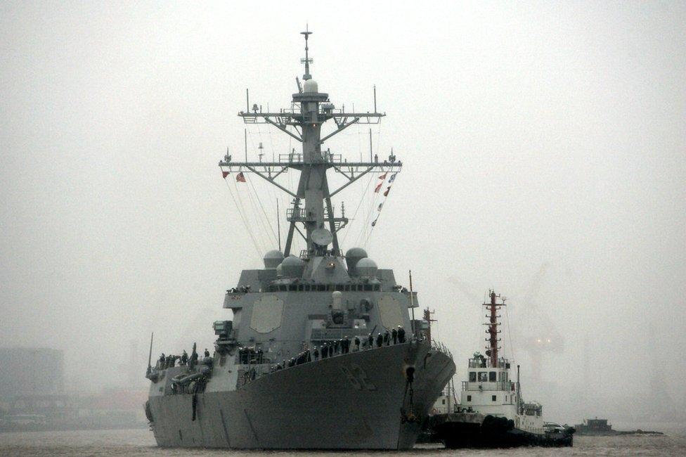 In this 8 April 2008, file photo, guided missile destroyer USS Lassen arrives at the Shanghai International Passenger Quay in Shanghai, China, for a scheduled port visit