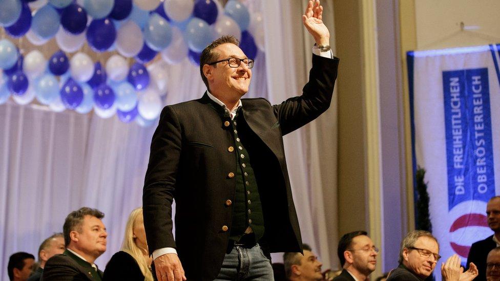 Heinz-Christian Strache, Austrian Vice-Chancellor and leader of the Austrian Freedom Party, waves at a party conference in Ried, Austria, 14 February 2018