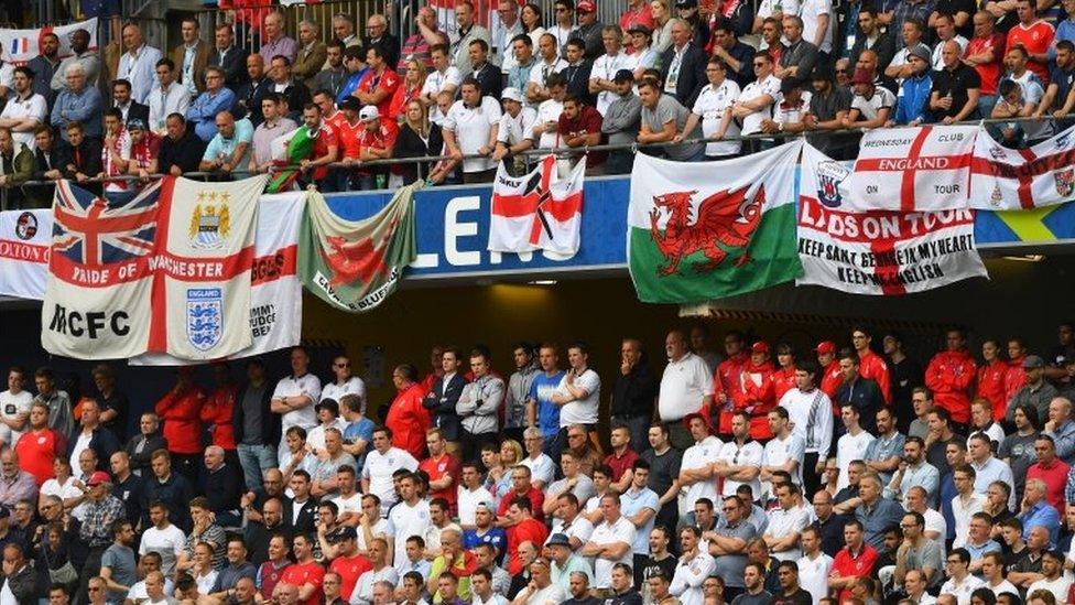 Wales and England fans and flags in Lens