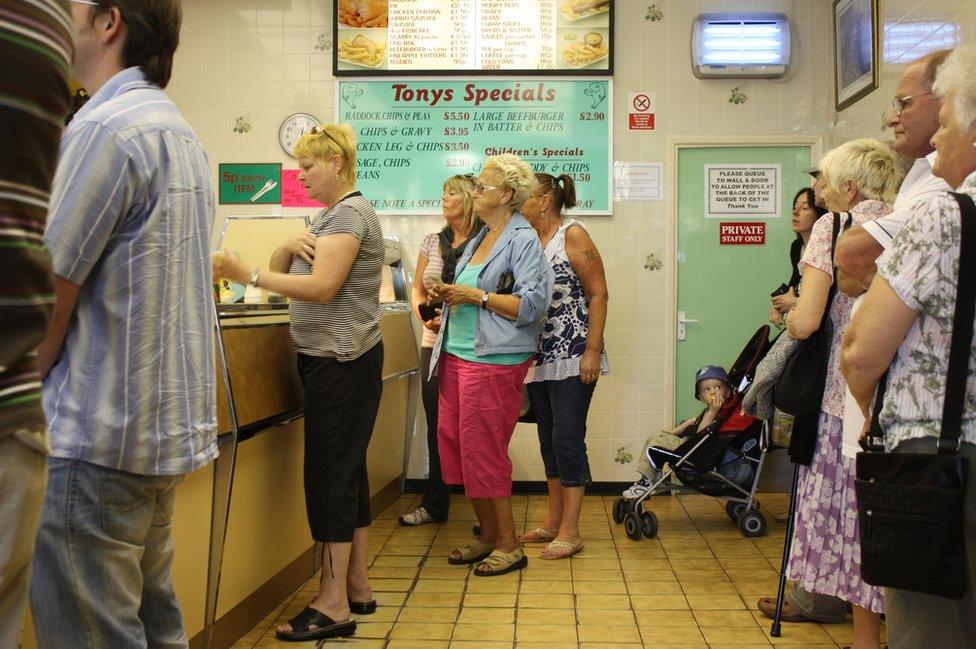 Lunchtime rush at a typical British chippy