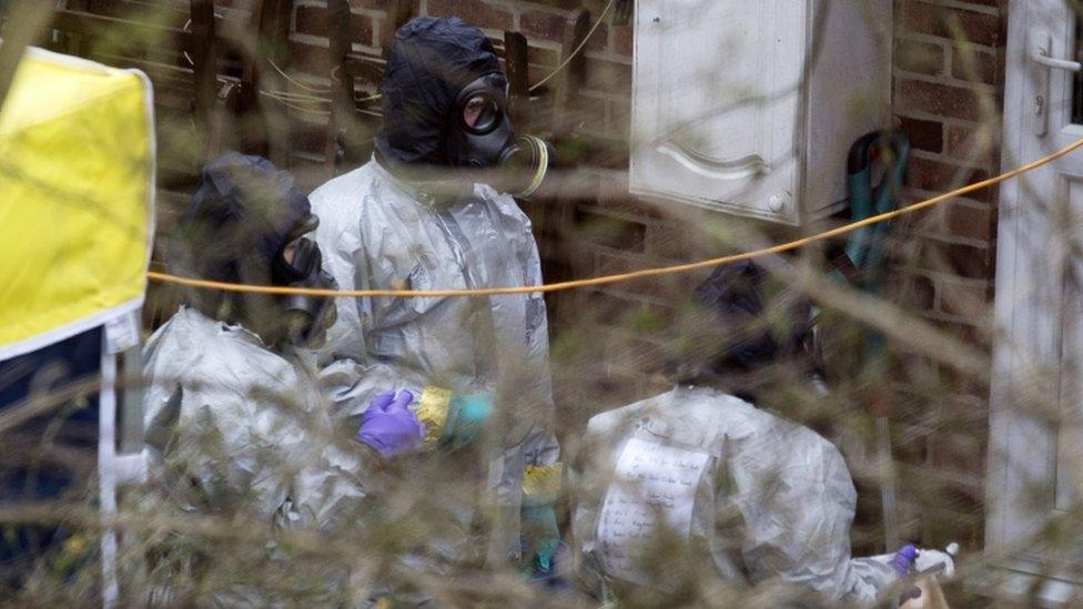 A team believed to be from the OPCW carry out tests in Salisbury