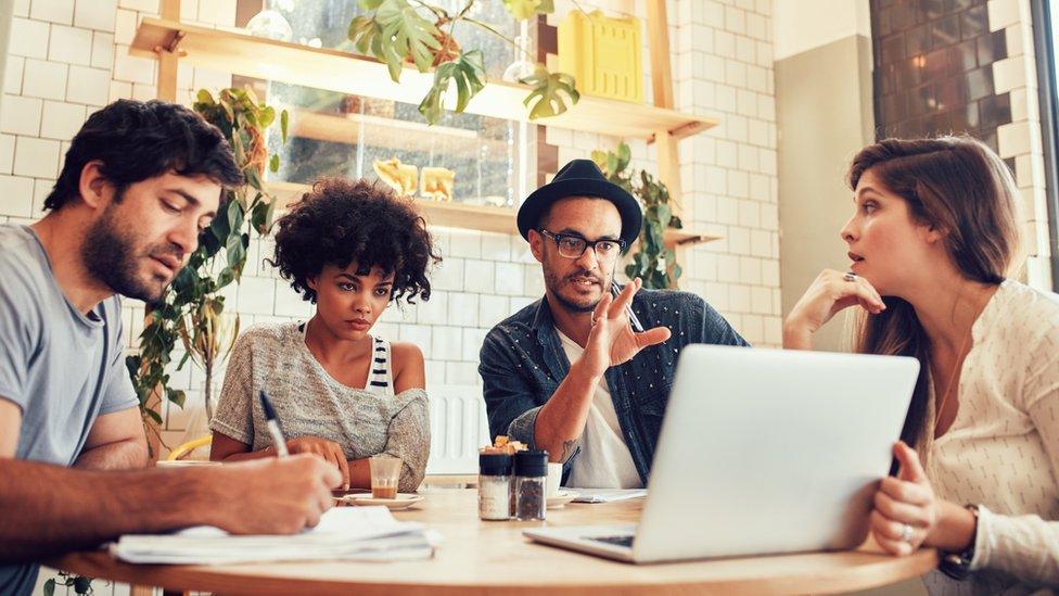 File image of people working in coffee shop