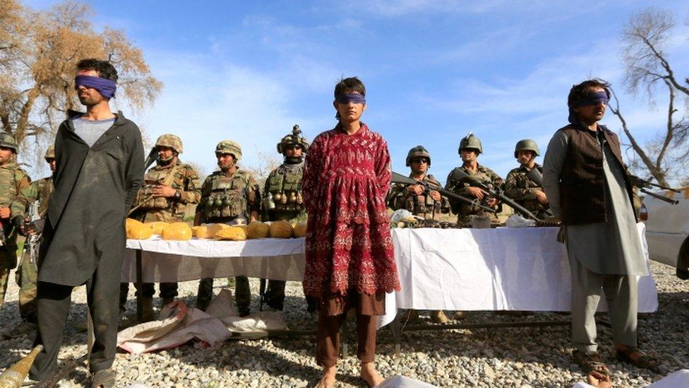 Suspected Taliban militants held by Afghan security forces in Jalalabad, 17 March