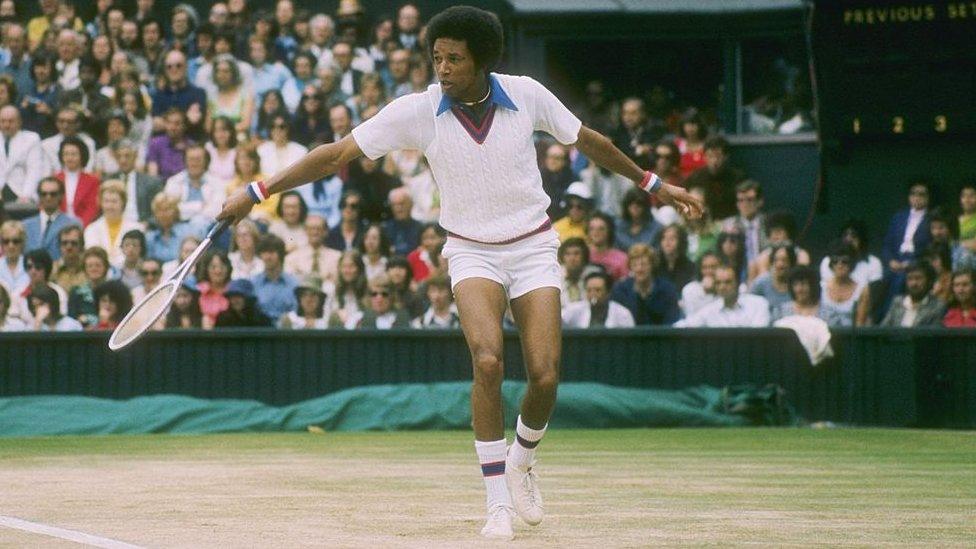 US tennis player Arthur Ashe playing at Wimbledon in London, the UK