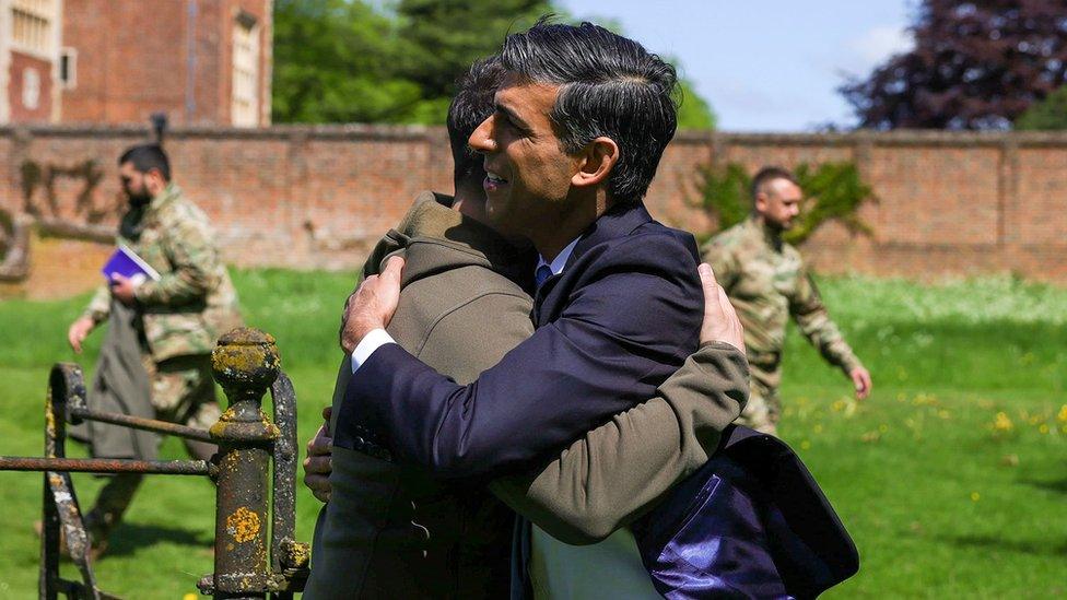 Rishi Sunak hugs Volodymyr Zelensky