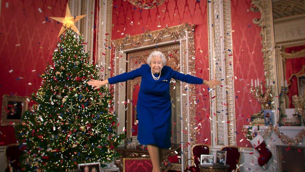 An image apparently of the Queen dances on a table in Channel 4's Christmas message