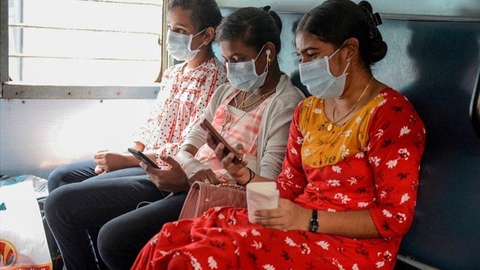 Indian women on a train