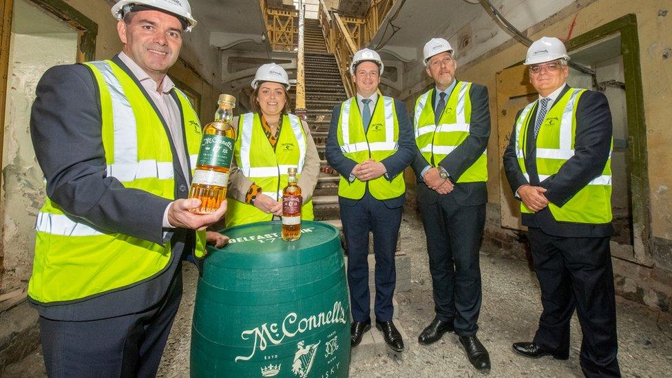 John Kelly, Deirdre Hargey; Gordon Lyons; John O'Dowd;and Mel Chittock from Invest NI at the gaol