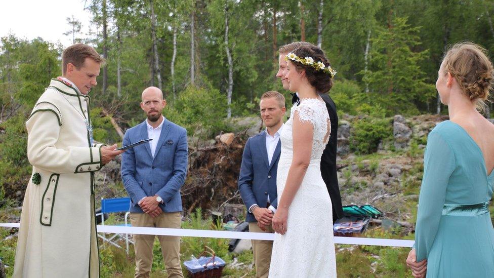 Couple getting married in forest