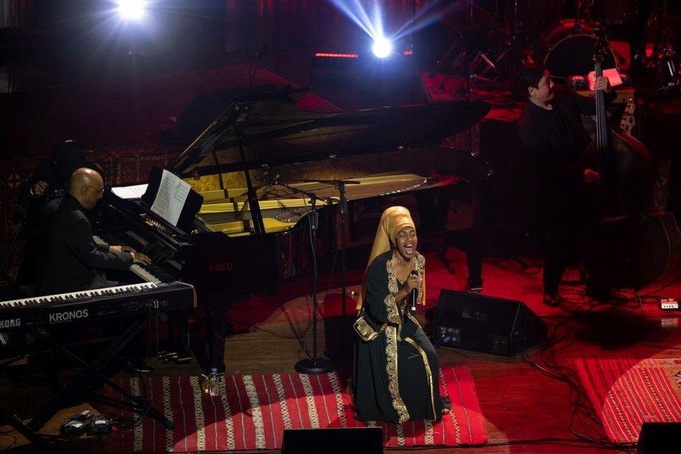 US jazz singer, Jazzmeia Horn (C) performs during the international jazz day 2024, in Tangiers.