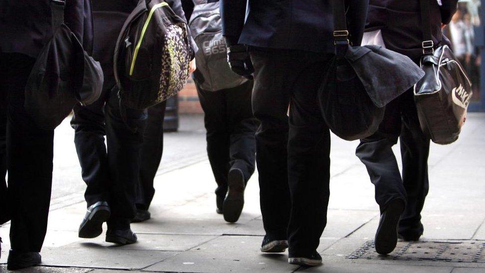 School pupils walking to school