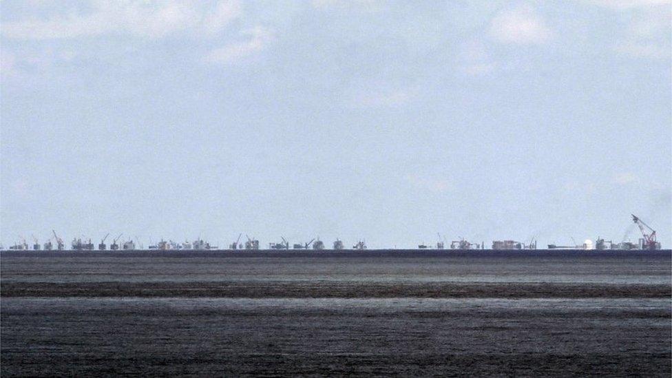 The alleged ongoing land reclamation seen from Pagasa or Thitu island in the Spratlys group of islands in the South China Sea