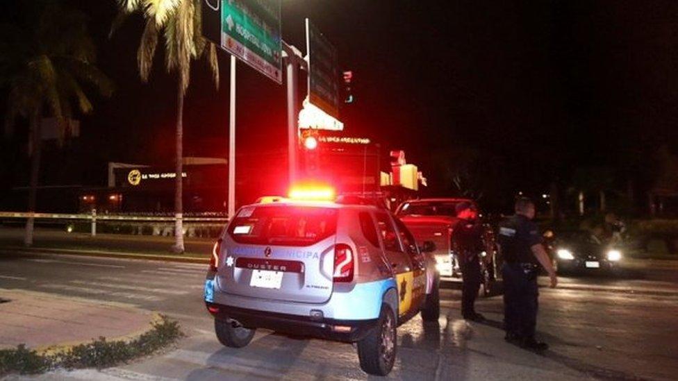 Police officers guard a crime scene where an unidentified assailant shot dead Aristoteles Sandoval, ex-governor of the Mexican state of Jalisco, in Puerto Vallarta, Mexico December 17, 2020