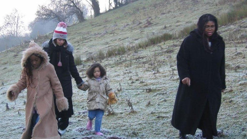 Kandace, her mum and sisters in 2003 after first moving to Wales