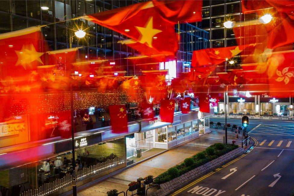 Chinese and Hong Kong flags are seen ahead of Chinese President Xi Jinping's arrival in Hong Kong for the 20th anniversary of the handover from Britain to China on June 28, 2017 in Hong Kong, Hong Kong