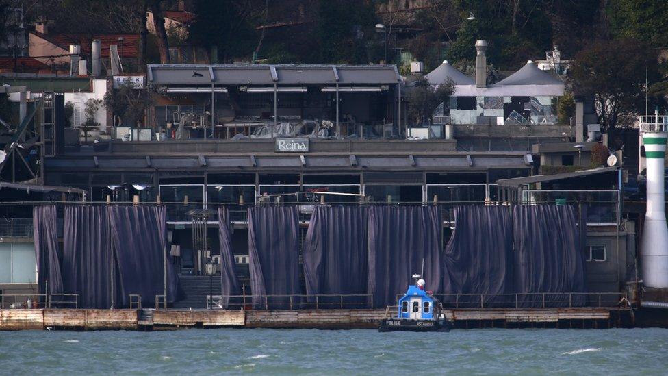 A view of the Reina nightclub with curtains drawn around the waterfront terrace