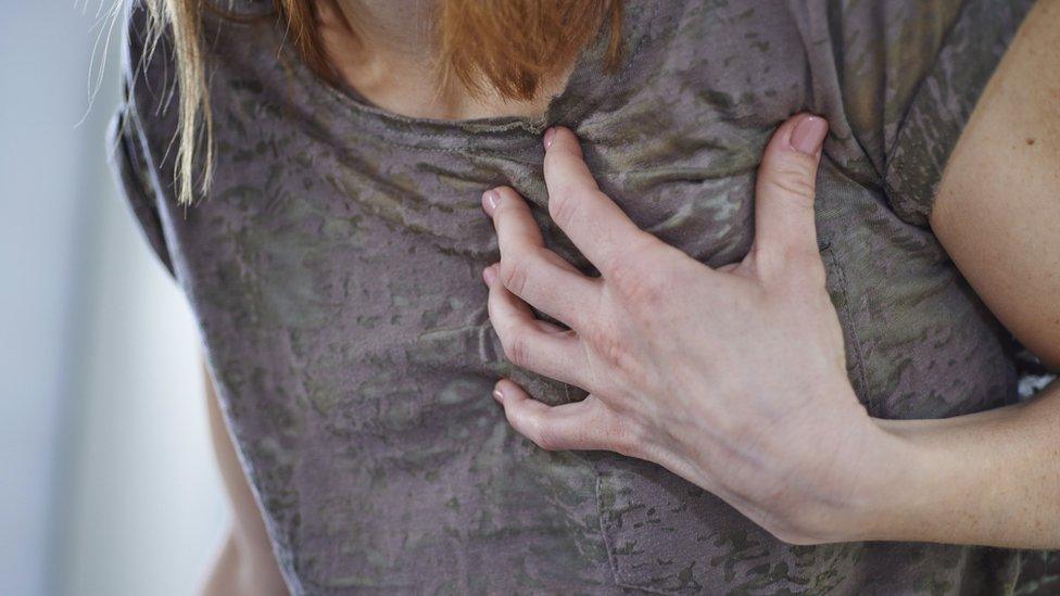 woman with chest pain