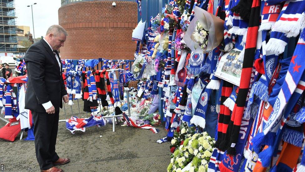 Rangers manager Ally McCoist lays a wreath in memory of club favourite Sandy Jardine