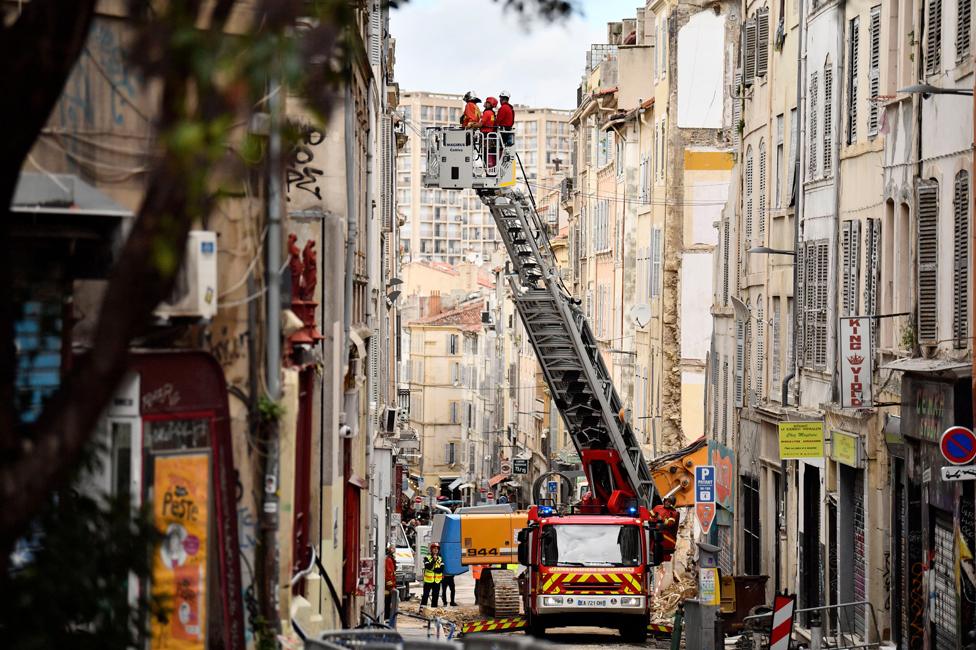 Emergency workers on the Rue d'Aubagne