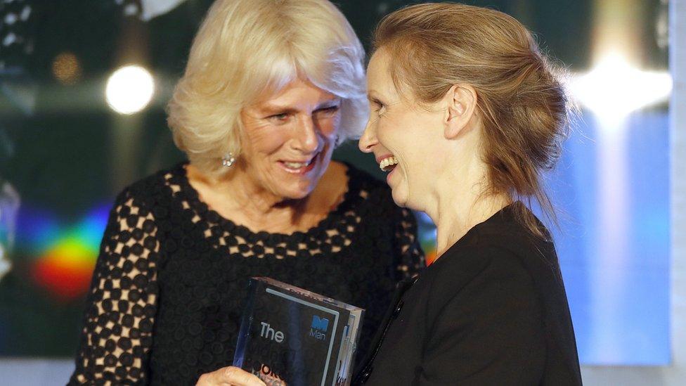 The Duchess of Cornwall presenting Anna Burns with the trophy