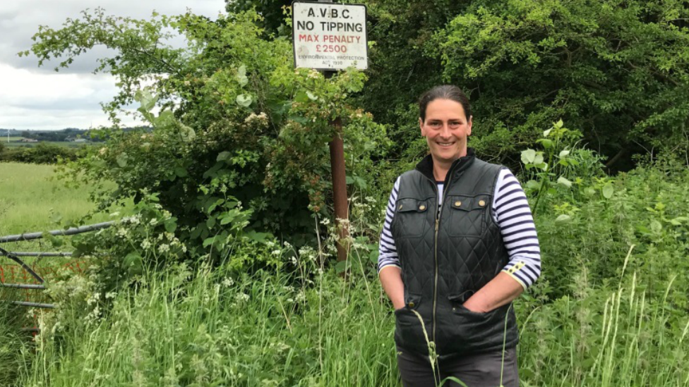 Campaigner Kellie Judson in field standing in field she wants to protect