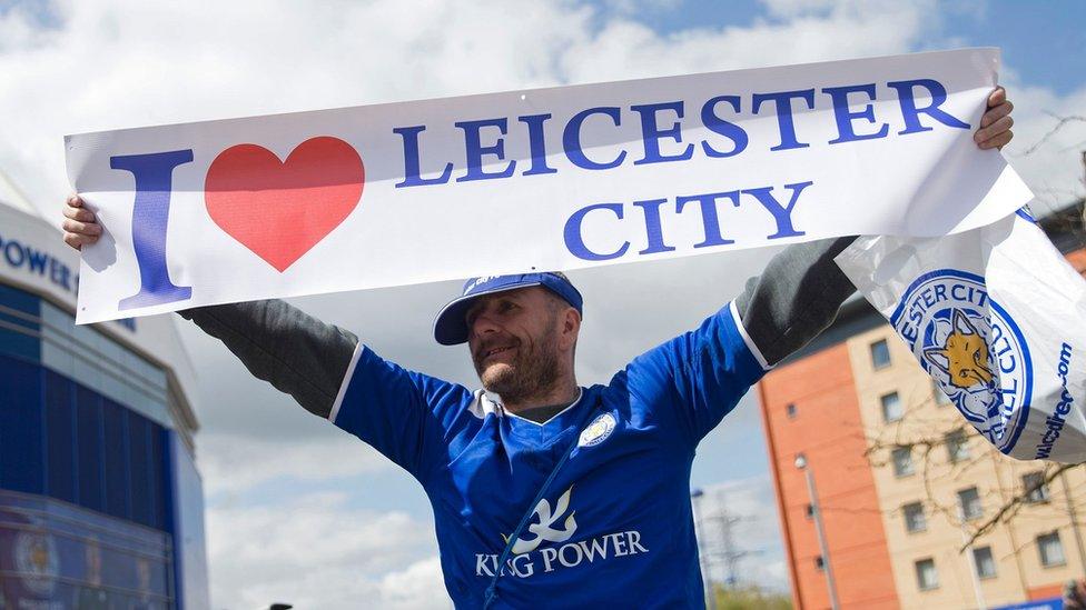 Leicester city fans celebrate outside the King Power Stadium in Leicester, central England, on May 3, 2016, after the team won the English Premier League