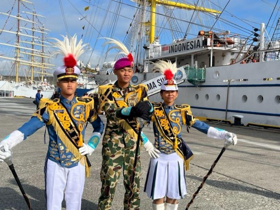 Indonesian crew members in front of their ship.