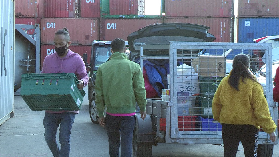 A container is filled with items of aid