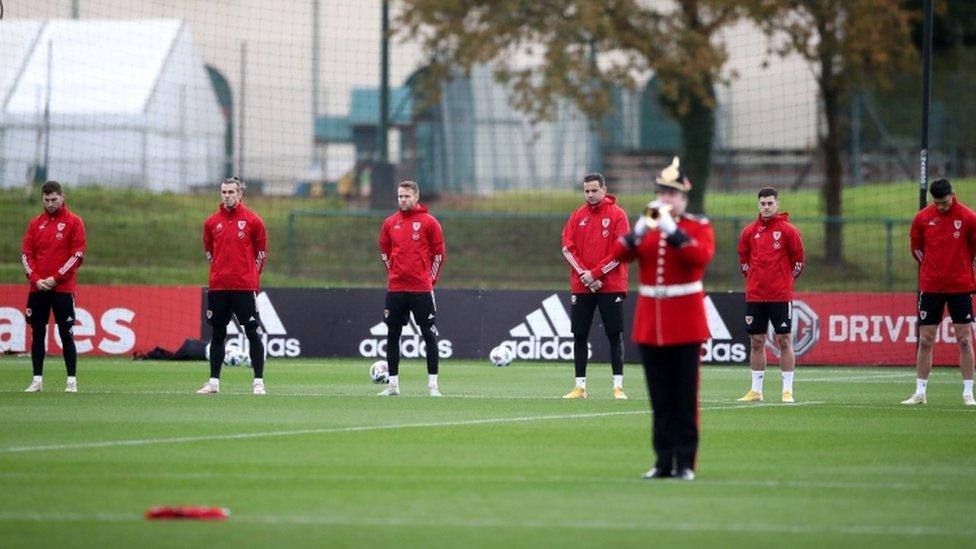 Wales footballers took part in the silence during training on Wednesday